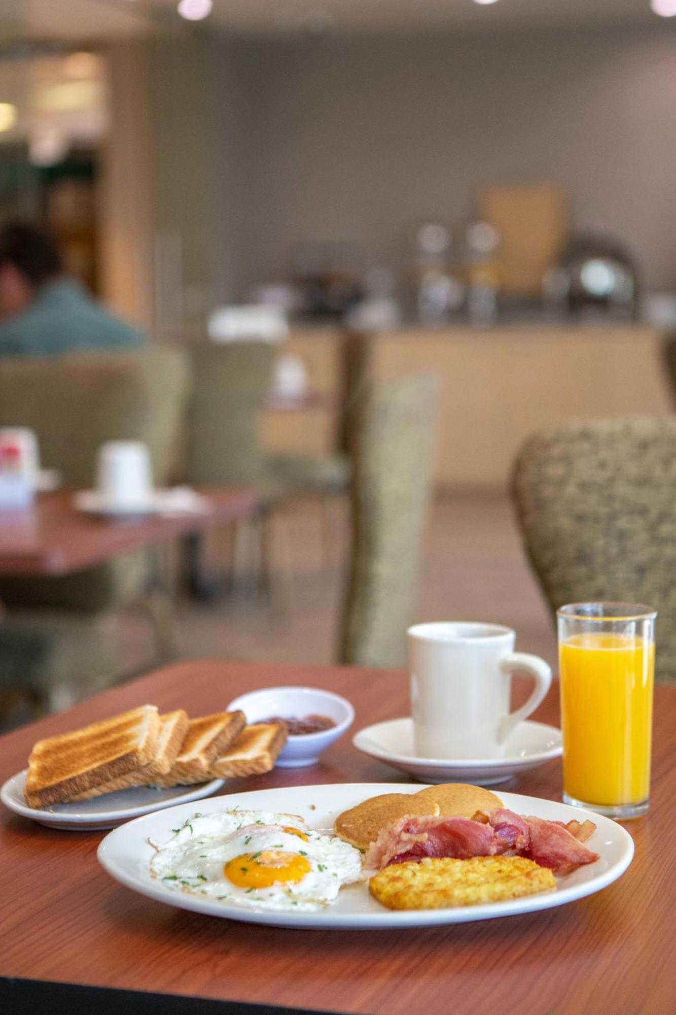 La Joya Pachuca Hotel Ngoại thất bức ảnh A breakfast with orange juice